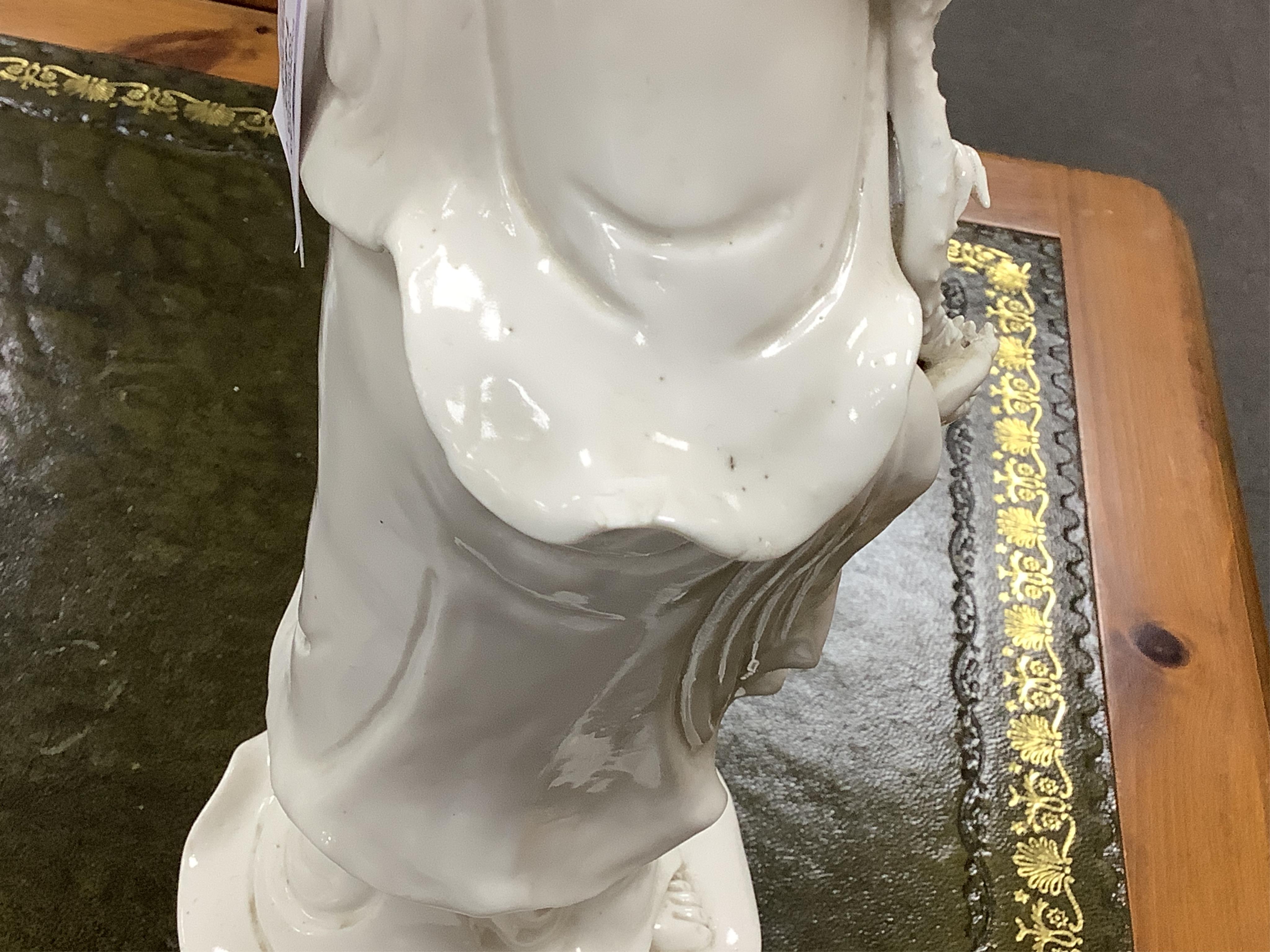A Chinese blanc de chine figure of Guanyin, 42cm high